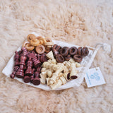 Wood Checkers & Chess Pieces in a Muslin Bag