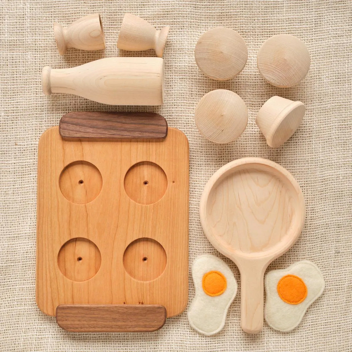 Wooden play kitchen accessory set: muffin pieces, milk jug and cups, wooden pan