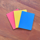 Small Lesson Book Journal Trio, Portrait Format, Red, Blue, Yellow 8.3" x 6.3" - with onion skin