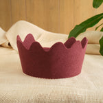 Felt crown with burgundy color, scalloped crown points, sturdy wool felt
