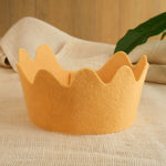 Felt crown in golden yellow with scalloped crown points, wool felt