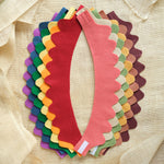 Set of 6 wool felt crowns, layered assortment in bright red, pink, purple, and green